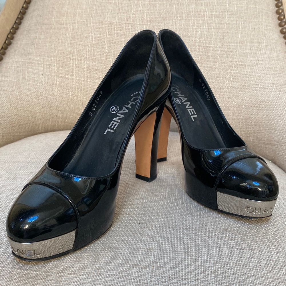 CHANEL black leather toe cap logo debossed metal plate platform chunky pump
